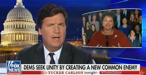 Tucker Carlson Slams Stacey Abrams Suggests She Wants To Overthrow