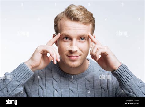 Handsome Fair Haired Man Thinking Hard Stock Photo Alamy