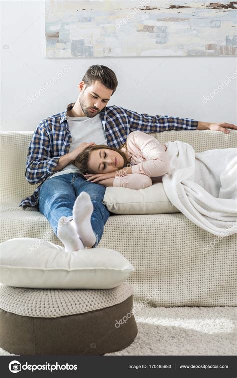 Young Man Watches Girlfriend Sleep — Stock Photo © Allaserebrina 170485680