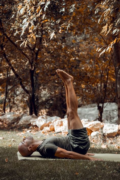 Handsome Sportive Man Doing Yoga In Stock Image Colourbox