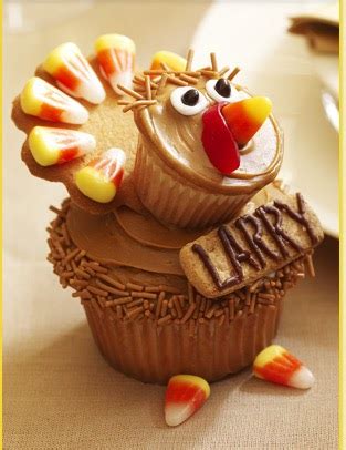 Turkey cupcakes made with hershey kiss faces and reese's pieces feathers! Thanksgiving cupcake decorating how-to and recipes from ...