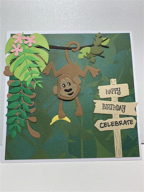 A Birthday Card With A Monkey Hanging From A Tree