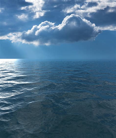 Background Image Of Stormy Sky Over A Calm And Reflective Ocean