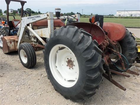 Rear Of International 504 With White 2000 Loader Farmall