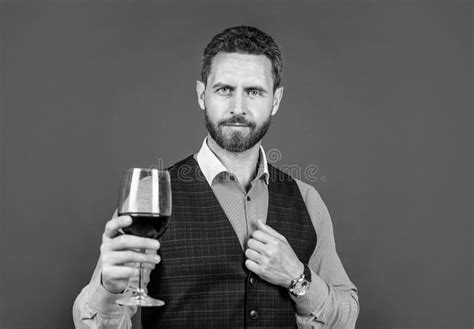 Handsome Man In Formal Wear Hold Glass Of Red Wine For Drinking Cheers Stock Image Image Of