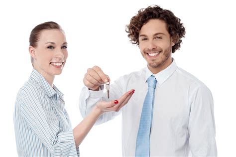 Businessman Handing Over The Key Professional Female Tie Employees