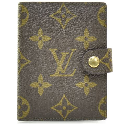 This stylish cardholder is crafted of classic louis vuitton brown monogram on the toile canvas. LOUIS VUITTON Monogram Credit Card Photo Holder 22113