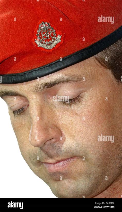 Militarty Soldier Looking Down Uniform Beret Head Head Shot Hi Res