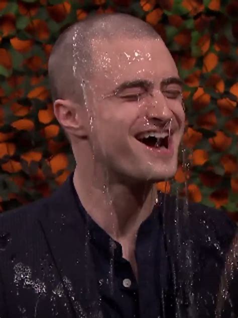 Watch Daniel Radcliffe Get Soaked With New Bald Hairdo