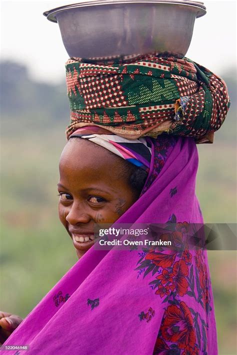 Fulani Woman Balancing Basin On Her Head After Going To The Market High