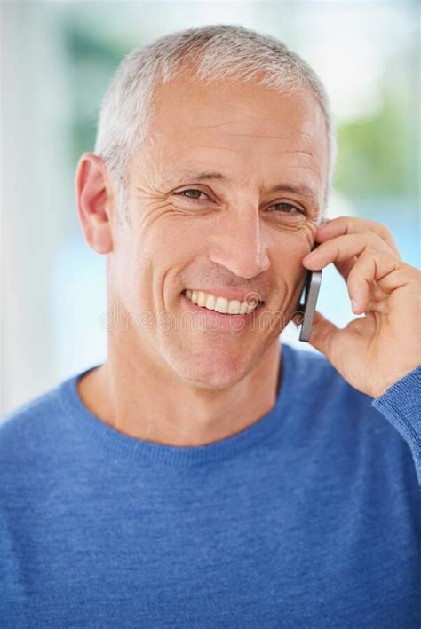 Its Always A Laugh When They Talk Portrait Of A Smiling Mature Man Talking On A Cellphone In