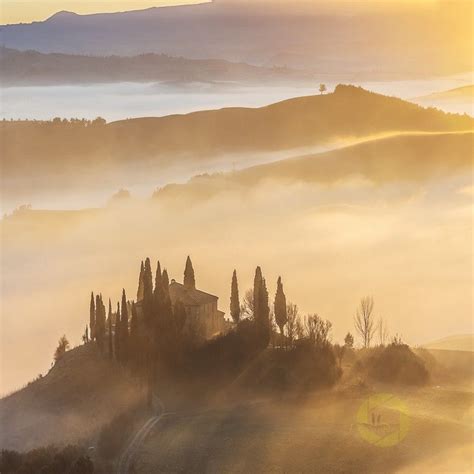 Fantastic Tuscan Landscape In The Fog And The Light Of The Risin