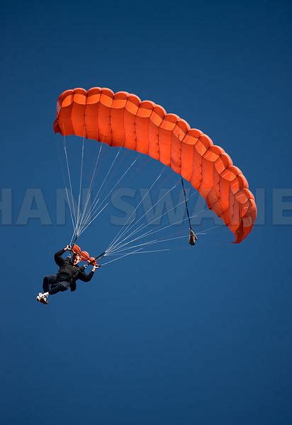 Johan Swanepoel Stock Images And Prints Red Parachute Against Blue Sky