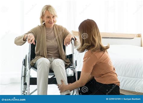 Grown Up Daughter Take Care Mother Sit Wheelchair Stock Image Image