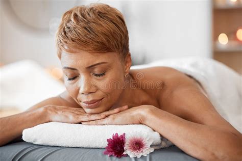 Wellness Massage And Black Woman At Spa Sleeping On Cosmetology Salon Bed For Relaxing Back
