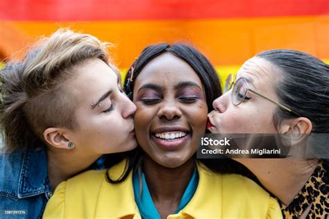 lgbt people activist for equality and rights three lesbian women kissing mixed age range fluid
