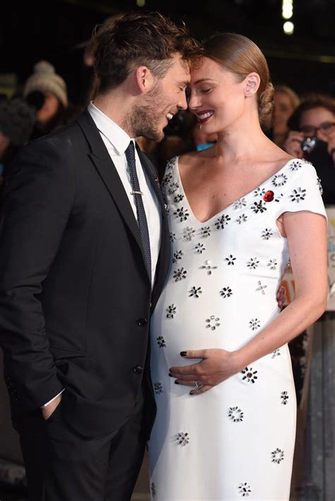 the hunger games sam claflin gushes over pregnant wife laura haddock as they reveal they re