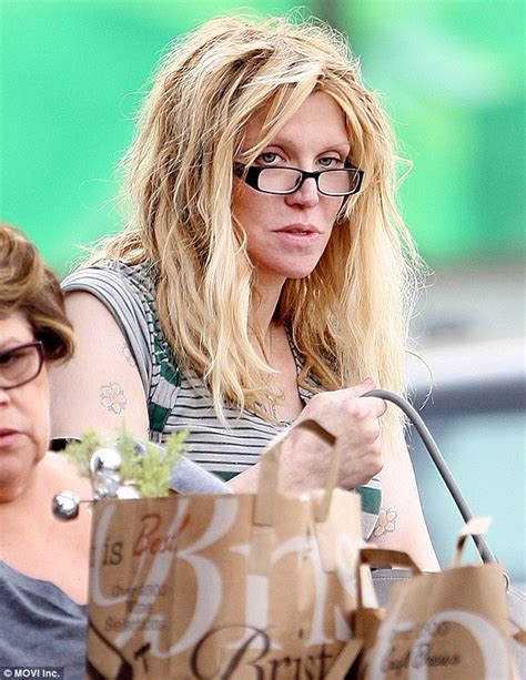 Courtney Love Dons Glasses To Check Her Receipt On Shopping Spree