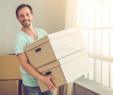 Handsome Man Moving Stock Photo Image Of Handsome Heavy 77673100