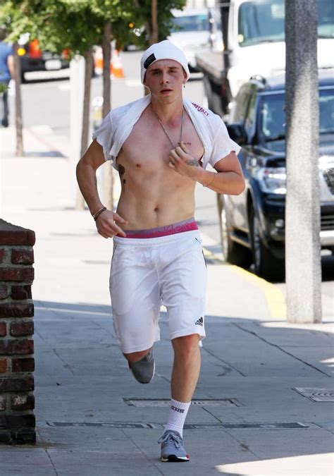 Brooklyn Beckham Flashes His New Tattoo And Abs As He Works Up A Sweat