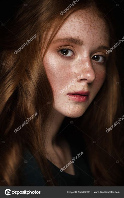 Beautiful Redhead Girl With A Perfectly Curls Hair And Classic Make Up
