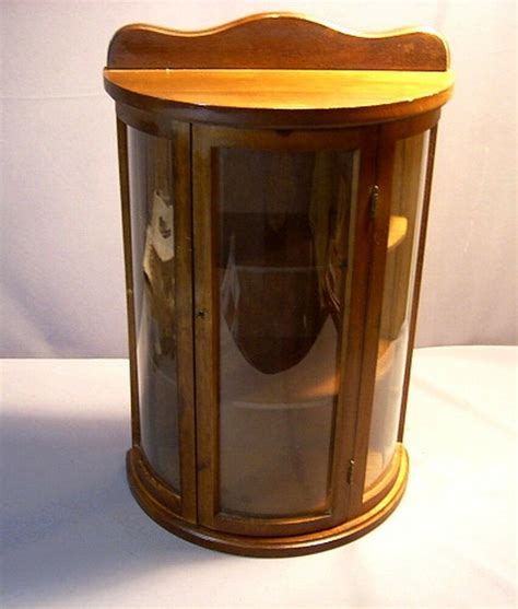 I am listing several other display cabinets this week. SMALL WOOD CURIO CABINET W/CURVED GLASS DOOR & SIDES TABLE ...