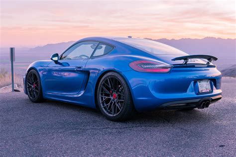Electric Blue Porsche Cayman Gets Upgraded With Accessories —
