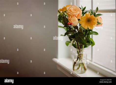 Beautiful Flower Bouquet On Window Sill Stock Photo Alamy