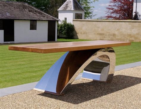 The modern garden above is designed for a family who want a safe and interesting backyard landscaping where their children can play safely. Modern garden bench - contemporary metal furniture - Chris ...