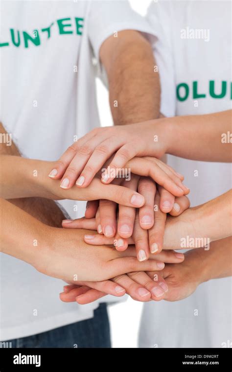 Volunteers Putting Hands Together Stock Photo Alamy