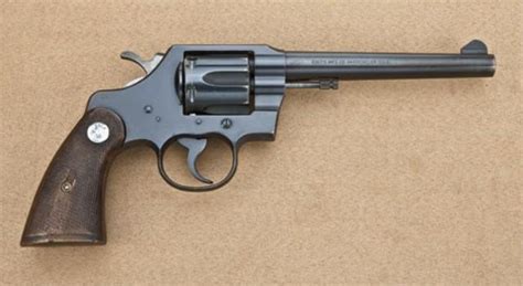 Colt Official Police 38 Special Caliber Double Action Revolver With