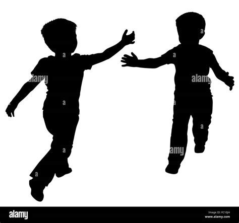 Silhouettes Of Two Little Boys Stock Photo Alamy