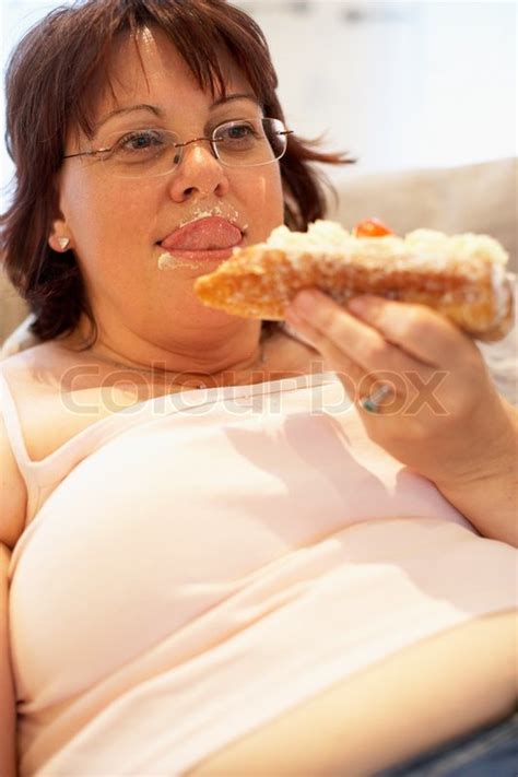 Chubby Woman Eating Stock Photo Colourbox