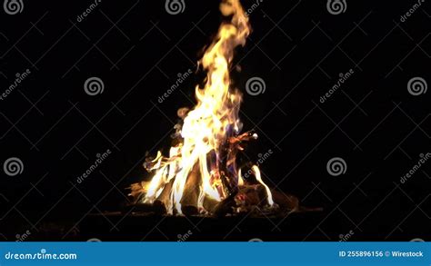 Closeup Of The Brightly Burning Fire Flames In The Darkness Stock