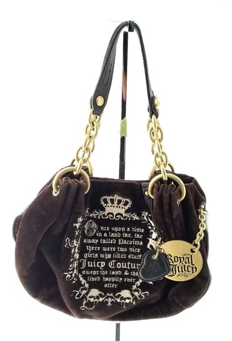 This Authentic Juicy Couture Purse Is Made Of Velour And Features