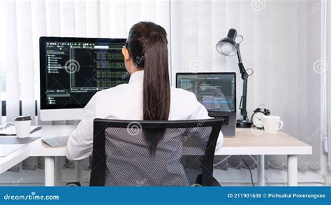 Asian Woman Programmer Typing Source Codes Programming On Computer In