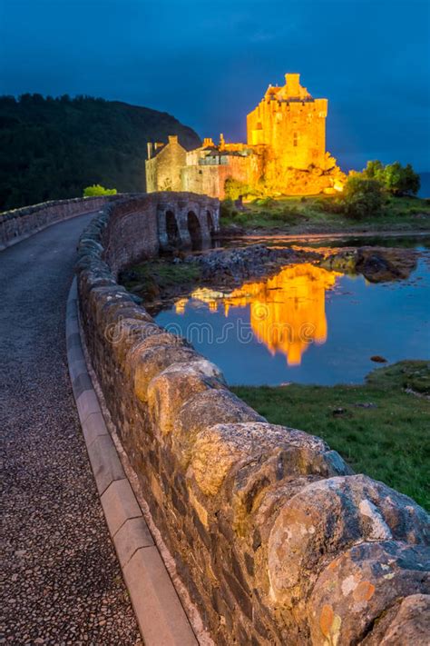 Wonderful Illuminated Eilean Donan Castle At Dusk Scotland Stock Photo