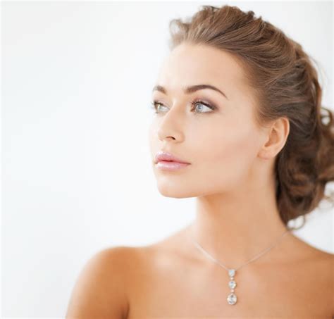Premium Photo Close Up Of Beautiful Woman Wearing Shiny Diamond Necklace