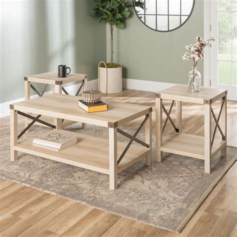 Choose a large oak coffee table with a wooden top and sleek, metal legs to add a modern twist to your living room. Walker Edison 3-Piece Rustic Wood and Metal Coffee Table ...