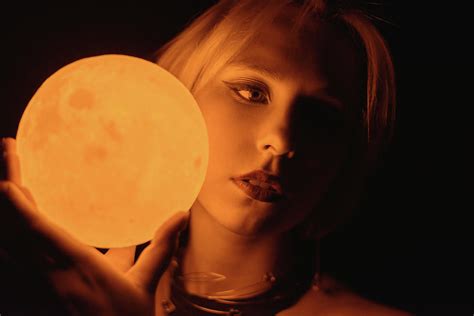 Woman Holding Moon Photograph By Vladimir Arndt Pixels