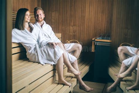 Young Happy Couple Relaxing Inside A Sauna At Spa Resort Hotel Luxury Stock Image Image Of