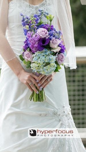 bridal bouquet with hydrangea delphinium ocean song roses and lisianthus lisianthus