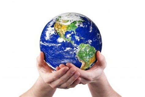 Two Hands Holding The Earth In Front Of White Background