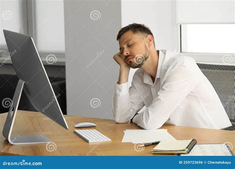 Sleepy Man Snoozing At Workplace In Office Stock Photo Image Of