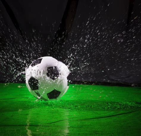 Soccer Football On Splashing Water Use For Sport Ball Equipment