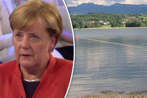 angela merkel booed by protesters after horrific migrant sex attack on jogger daily star