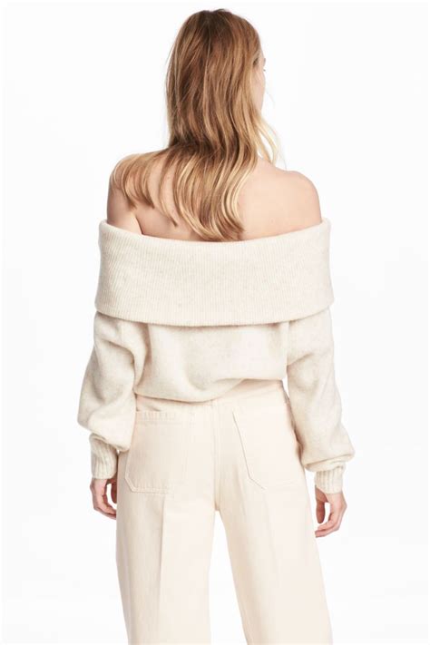 Natural White Off The Shoulder Jumper In A Soft Knit Containing Some