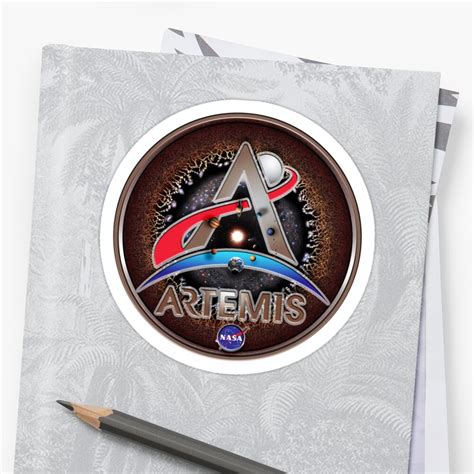 Nasa Artemis Logo With The Universe Sticker By Pablocbudassi Redbubble