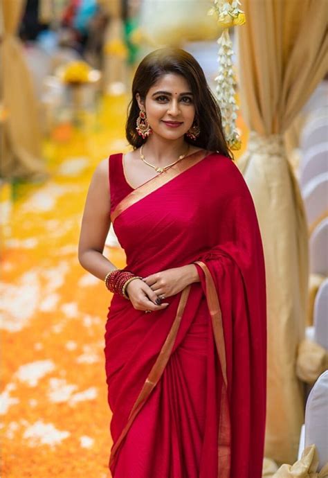 Malayalam Television Actress Malavika Wales In Red Saree Stills