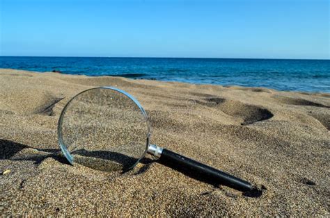 Magnify Glass On The Sand Beach Stock Photo Image Of Paradise